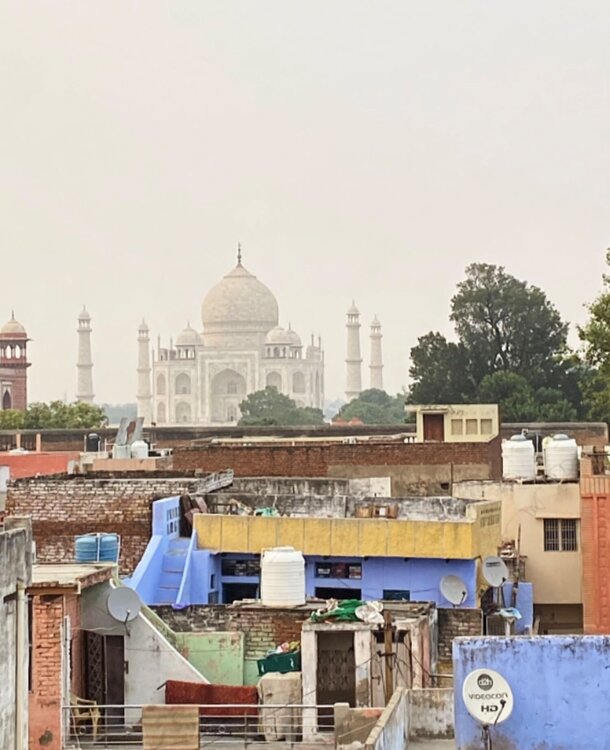 Taj Mahal behind the streets Alienor Chateau