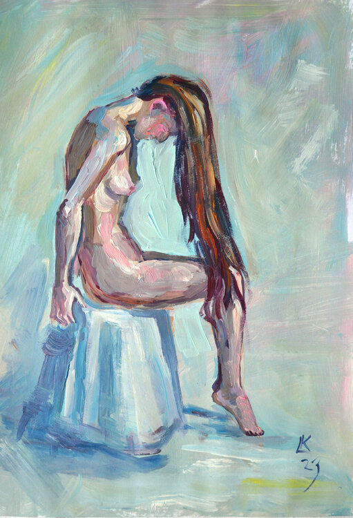 Nude woman with long hair sitting Lada Kholosho