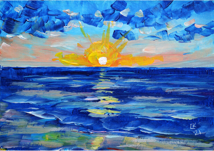 Rising sun over beach Lada Kholosho