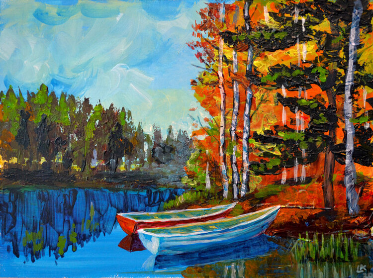 Boats on a lake. Autumn landscape. Lada Kholosho