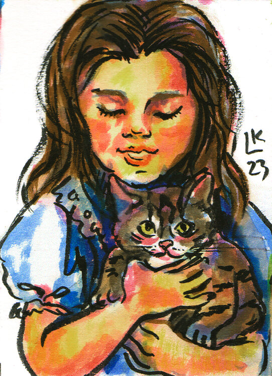 Little girl and her tabby cat Lada Kholosho